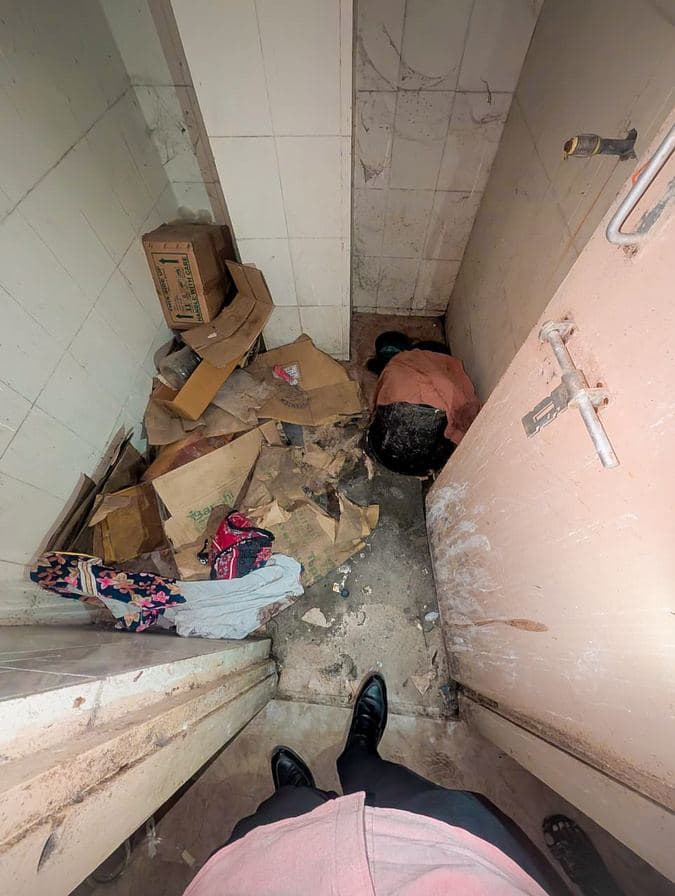 Deteriorated hospital washroom before renovation (3)